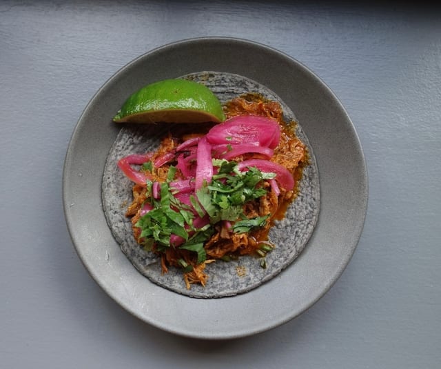 1\2 Tray Cochinita Pibil.